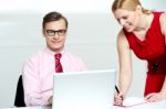 Business Couple with laptop Stock Photo