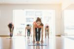 Asian Woman Doing Yoga Indoors Stock Photo