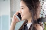 Portrait Of Thai Teen Beautiful Girl Calling Smart Phone Stock Photo