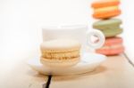 Colorful Macaroons With Espresso Coffee Stock Photo