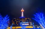 Kyoto Tower At Night In Kyoto, Japan Stock Photo