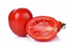 Tomato With Cut Isolated On White Background Stock Photo