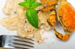 Italian Gnocchi With Seafood Sauce With Crab And Basil Stock Photo