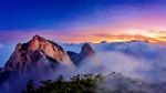 Bukhansan Mountains Is Covered By Morning Fog And Sunrise In Bukhansan National Park, Seoul In South Korea Stock Photo