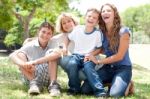 Family Posing For Camera Stock Photo