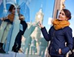 Girl Is Looking At Shop Window Stock Photo