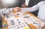 Two Confident Business Man Shaking Hands During A Meeting In The Stock Photo