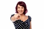 Sweet Woman Pointing At Camera Isolated Stock Photo