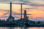 Oil Refinery At Twilight In Bangkok, Thailand Stock Photo