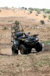 Quad Bike Standing In Muddy Stock Photo