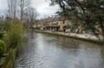 Tourists Wandering Around Bourton-on-the-water Stock Photo