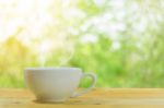 Coffee Mug On A Wooden Floor Stock Photo