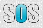 Sos on jigsaw background Stock Photo