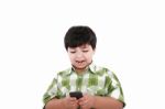 Boy Text Messaging Stock Photo