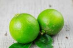 Lime On Wooden Stock Photo