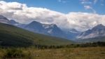 Purple Mountains Next To Lower Two Medicine Lake Stock Photo