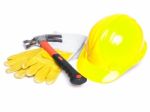 Hard Hat Hammer And Leather Gloves Stock Photo