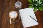 Notebook Pen And Cup Of Coffee Stock Photo