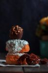 Donuts And Chocolate On Table Stock Photo