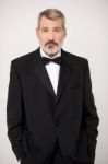 Senior Businessman In Tuxedo Stock Photo