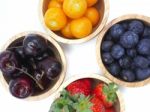 Fresh Summer Fruits, Cherry, Strawberry, Cape Gooseberry And Blu Stock Photo