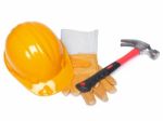 Hard Hat Hammer And Leather Gloves Stock Photo