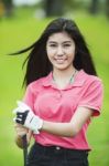 Asia Lady Relax With Golf Stock Photo