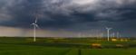 Fields With Wind Power Turbines Stock Photo