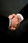 Closeup Of A Business Handshake Stock Photo