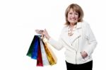 Woman With Shopping Bags On White Background Stock Photo