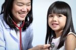 Doctor Checked Children Girl's Body Stock Photo