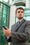 Businessman With The Smart Phone Stock Photo