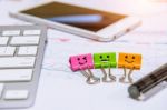 Smile Paper Clips, Keyboard, Pen, Tablet And Documents Stock Photo