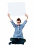 teenage Boy Showing Empty board Stock Photo