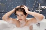 Girl Washes Her Head Stock Photo