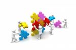 Business Teamwork Building Puzzles Together Stock Photo