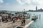 Boats Moored Near The Entrance To The Grand Canal Venice Stock Photo