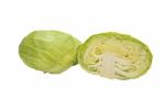 Closeup Cabbage And Cutted Cabbage On Wooden Isolated White Background Stock Photo