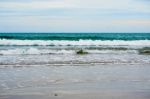 Sand Beach With Blue Ocean Stock Photo