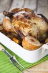 Roasted Chicken With Apples And Potatoes Stock Photo