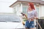 Woman Washing A Car Stock Photo