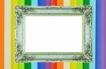 Vintage Silver Picture Frame On Rainbow Colorful Wall Stock Photo