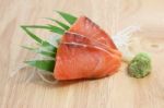 Salmon Sashimi In Wood Background Stock Photo