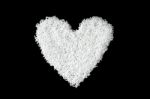 Pile Of Rice Seed By Heart Shape On The Black Background For Isolated Stock Photo