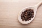 Coffee Beans In Spoon Stock Photo