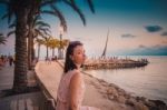 Calm Tourist Girl On Pier Stock Photo