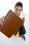 Sitting Girl Student Giving Book Stock Photo