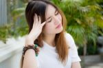 Portrait Of Thai Chinese Adult Beautiful Girl Denim Blue Bag Relax And Smile Stock Photo