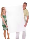 Couple With Blank White Board Stock Photo