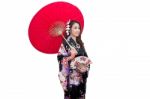 Beautiful Young Asian Woman Wearing Traditional Japanese Kimono With Red Umbrella Isolated On White Background Stock Photo